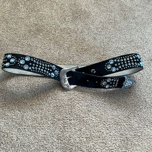 Leather belt with spots of fur and bling stones